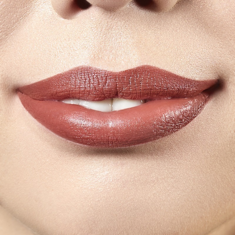 Motives LALA Liquid Lipstick, color I Dare You, showing closeup of lips on woman of dark complexion