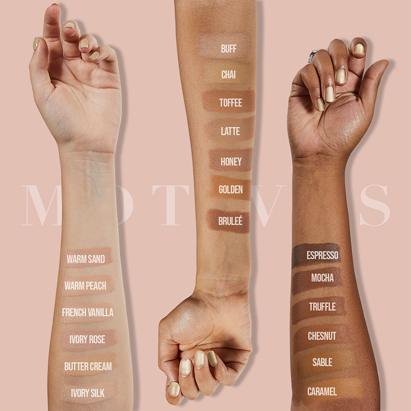 Motives Flawless Face Stick Foundation, shown as stripes of colors on three models' arms of light, medium and dark skin tones, for closest match.