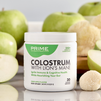 image of Prime Colostrum with Lion's Mane next to green apple slices and Lion's Mane mushroom
