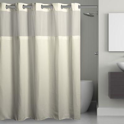 cream colored shower curtain