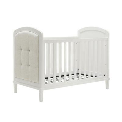 white tufted crib