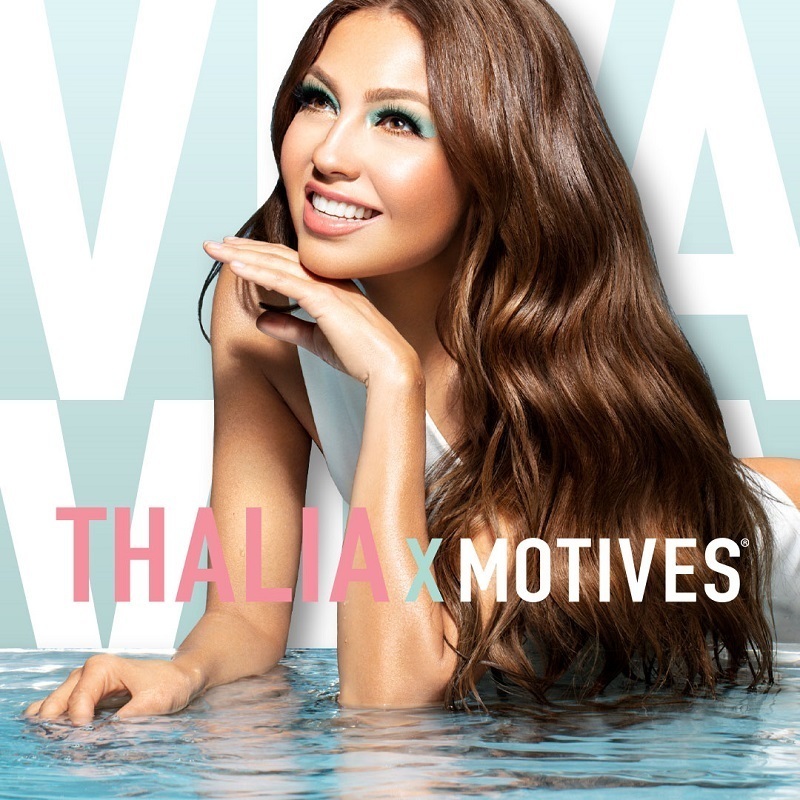THALIA X Motives Viva Eye & Cheek Palette, model with chin on hand, smiling