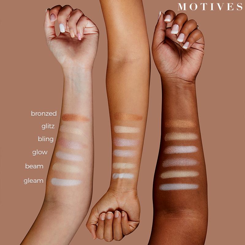 Three models' arms, light, medium and dark complexions, striped with Motives That Glow Tho Highlight Palette colors