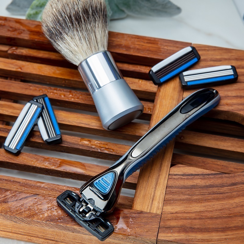 Shopping Annuity Brand Performance Razors Shaving System for Men along side a razor and shave brush