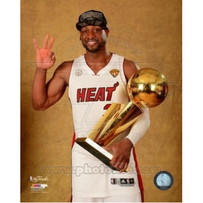 Photofile PFSAAQA01201 Dwyane Wade with the NBA Championship Trophy Game 7 of the 2013 NBA Finals Sports Photo - 8 x 10 