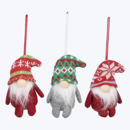 Handmade Christmas decorations: felt Santa boot isolated on whit