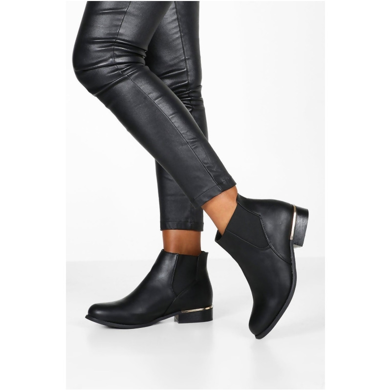 black metal trim chelsea boots