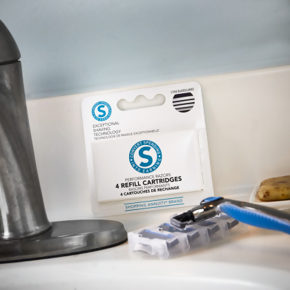 Shopping Annuity Brand Performance Razors Refill Cartridges shown with a razor on a bathroom sink