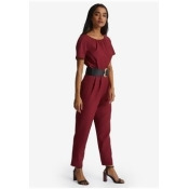 red belted jumpsuit