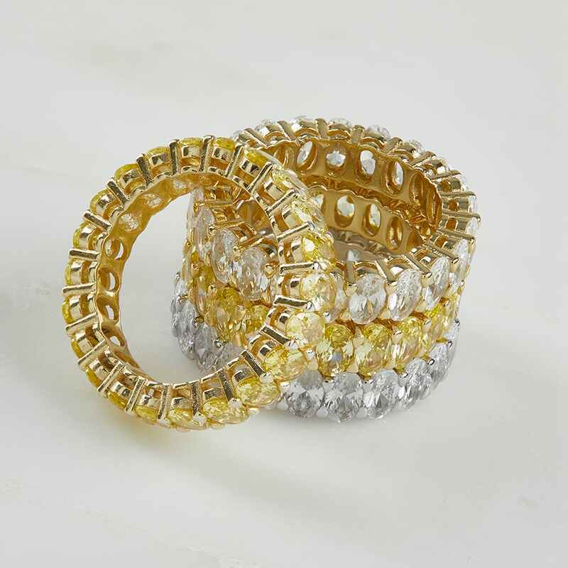 4 Layered KIMBERLY - Oval Cut Eternity bands, stacked, in silver and gold with clear gems and 2 in gold with yellow gems