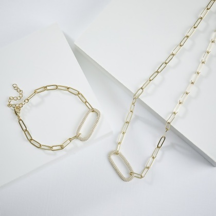 Layered MARIA - Paperclip Necklace With Pave Oval Link and MARIA - Paperclip Bracelet With Pave Oval Link, in gold