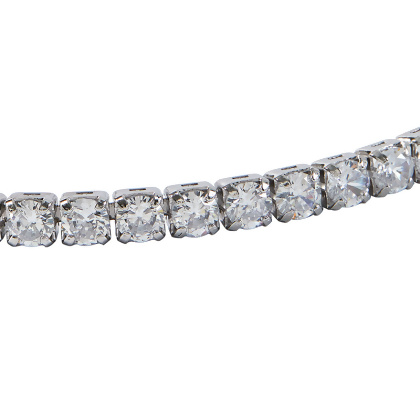 Closeup of Layered VIOLET - Round Cut Tennis Bracelet in silver with clear gems