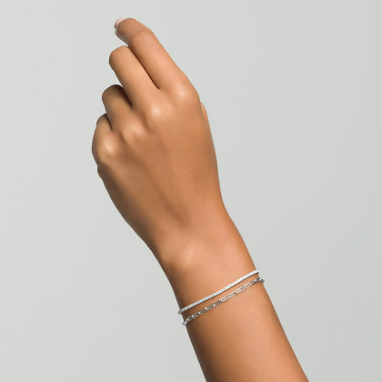 Woman's arm showing Layered ARIA - Multi Use Link and Stone Choker in silver, worn wrapped twice as double-bracelet, two looks in one