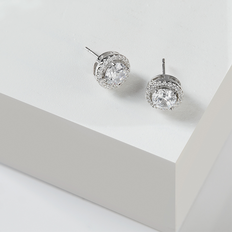 Layered Alexis - Halo Earring Studs in silver, on a white box