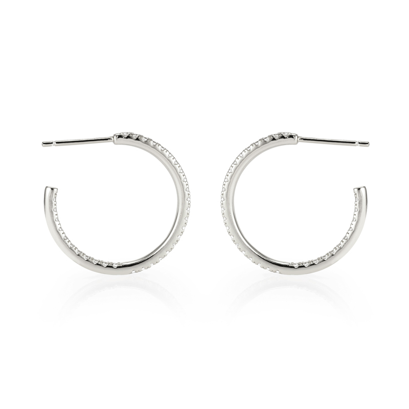 Closeup of Layered Sophie - Pave CZ Hoop Earrings in silver, side view