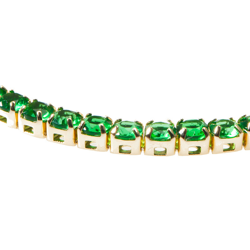 Close up of Layered VIOLET - Round Cut Tennis Bracelet, gold with green gems