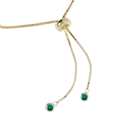 Closeup of Slip clasp for Layered VIOLET - Round Cut Tennis Bracelet in Gold with Green Gems at the end, with adjustable length