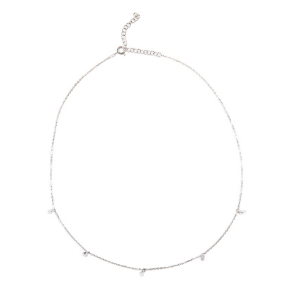 Closeup of Layered DESI - Pierced Round Cut Necklace in silver