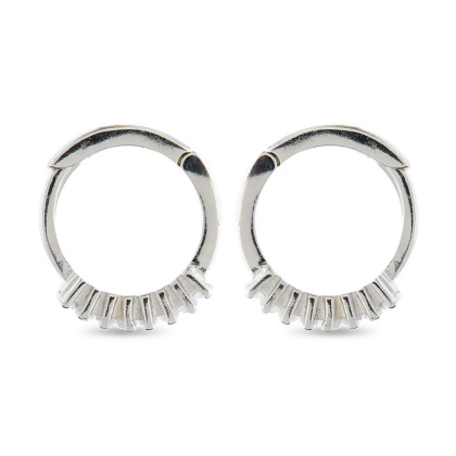Closeup of Layered silver Layered Geo - Mini Baguette Huggie Earrings in silver