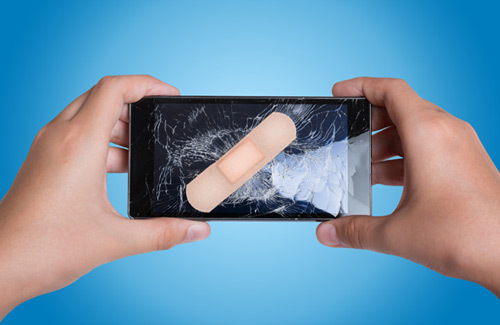 Holding a broken smart phone