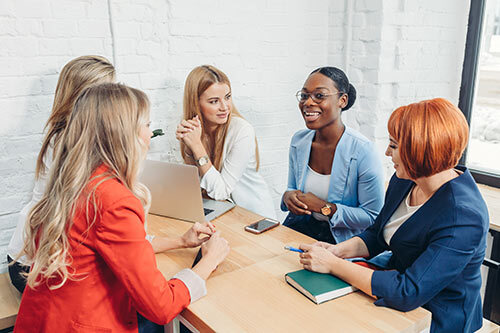People sitting at a table having meeting